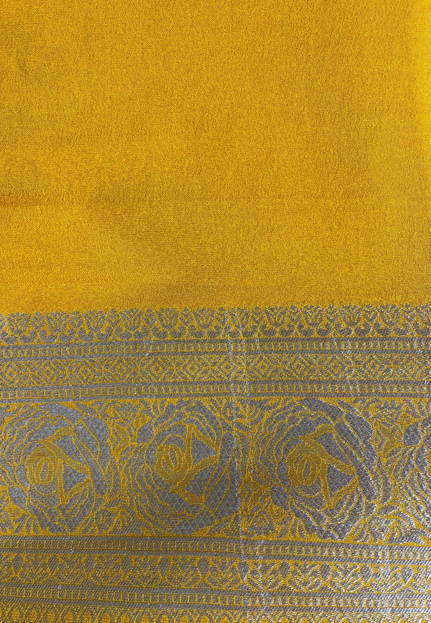 Yellow Georgette with Silver Zari Banarasi Silk Saree
